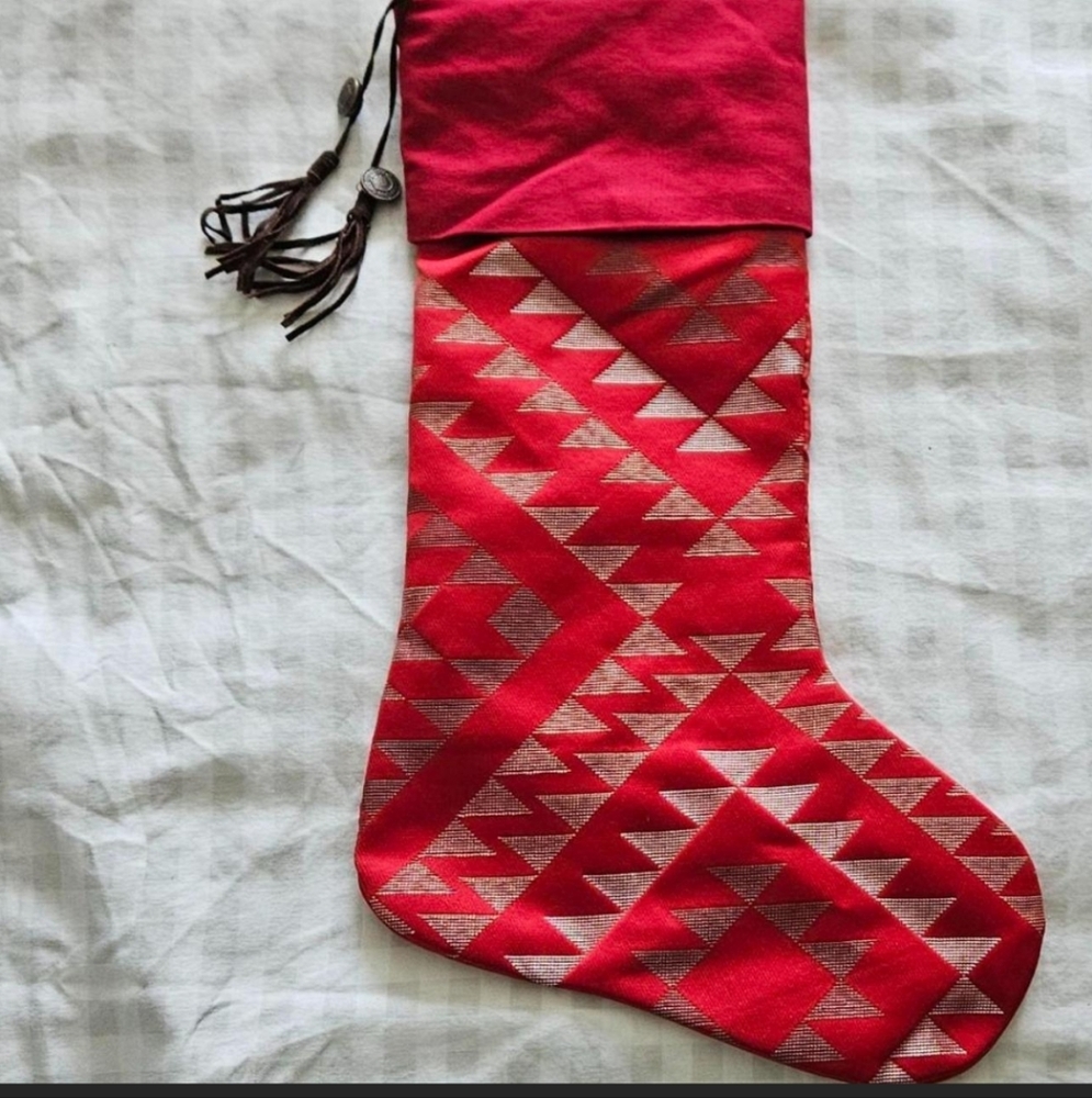 Red Christmas Stocking with suede tassles. Southwestern silver design